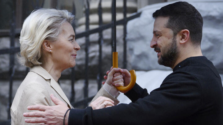 Ukraine's President Volodymyr Zelensky (R) greets European Commission President Ursula von der Leyen (L) in Kyiv on November 4, 2023. European Commission President arrived in Kyiv to discuss Ukraine's accession to the EU with Ukrainian President.
